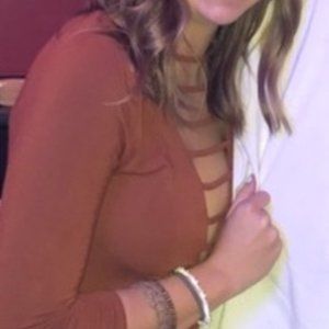 cut out bodysuit. size: 0. burnt orange color. super soft material.